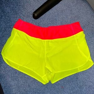 Neon yellow and pink workout shorts- size Medium